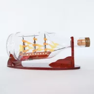 Model ladje Cutty Sark v steklenici Henessy